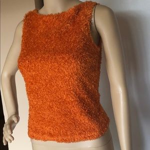 Orange fuzzy sleeveless sweater vest. Size small